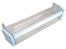 Polica dverovej chladničky na fľaše